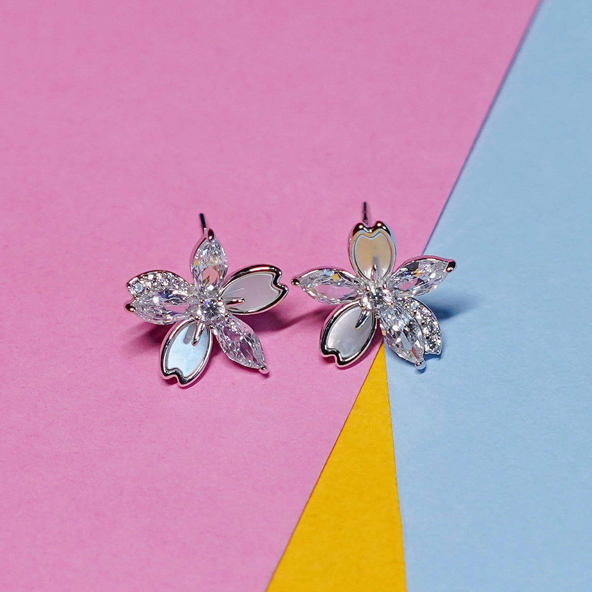IMPORTED BOLD FLOWER SILVER EARRINGS