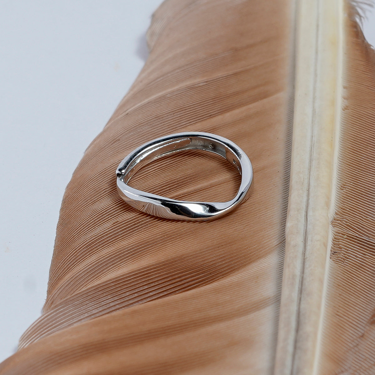 TWISTED MINIMALIST SILVER RING BAND