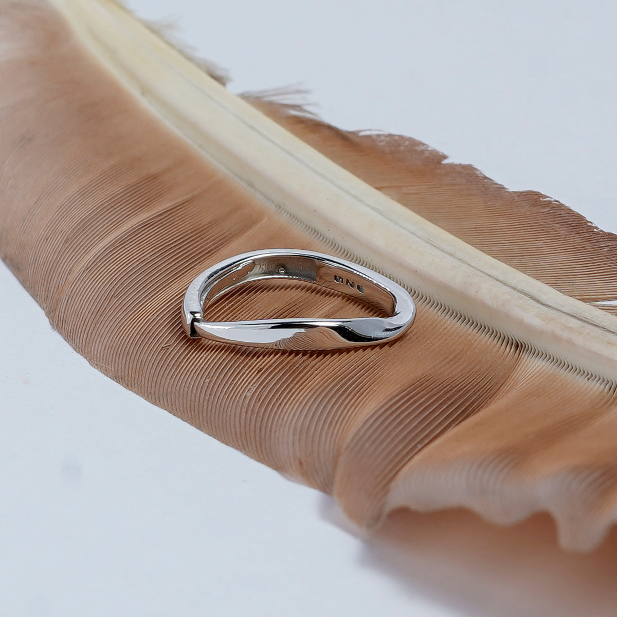 TWISTED MINIMALIST SILVER RING BAND