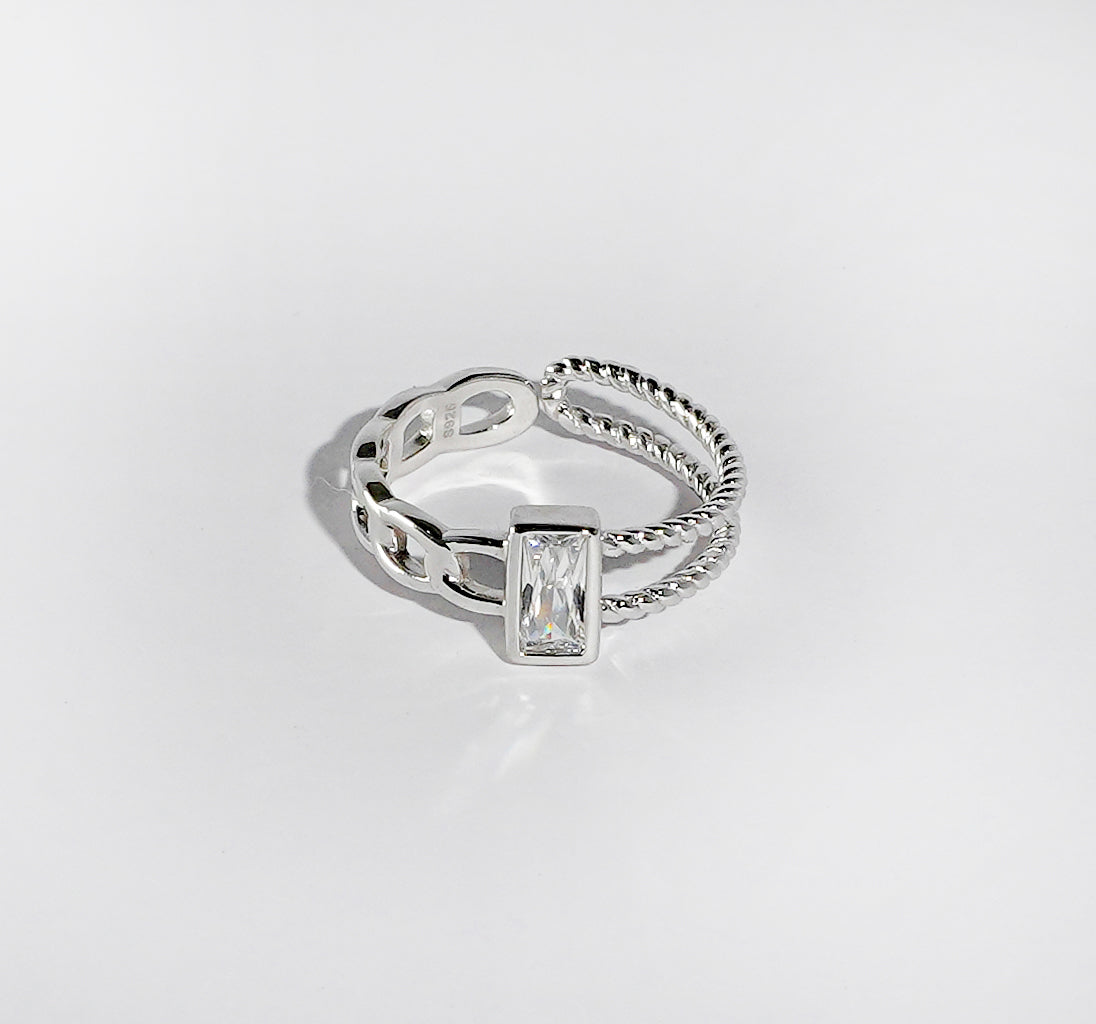 ASYMMETRICAL SOLITAIRE SILVER RING