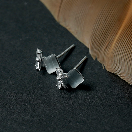 MICRO BOWTIE SHAPE SILVER EARRINGS