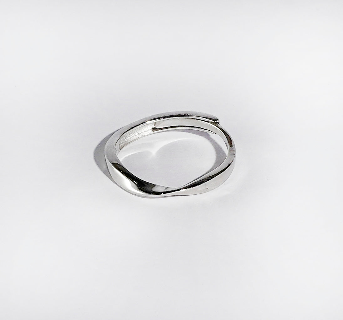 TWISTED MINIMALIST SILVER RING BAND