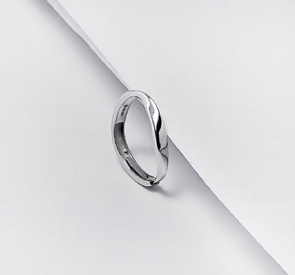 TWISTED MINIMALIST SILVER RING BAND