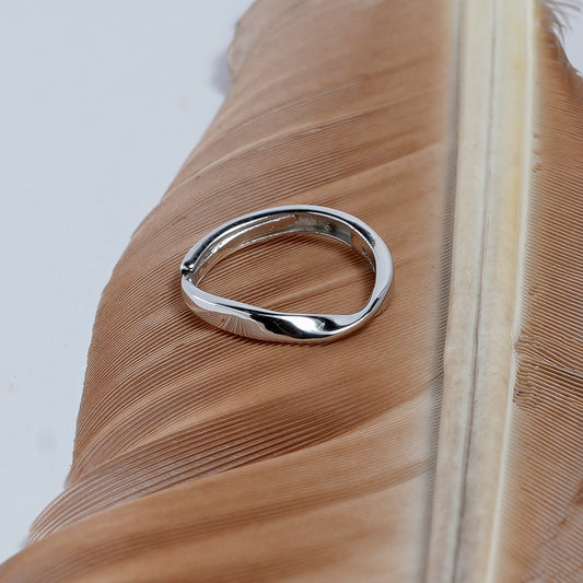 TWISTED MINIMALIST SILVER RING BAND
