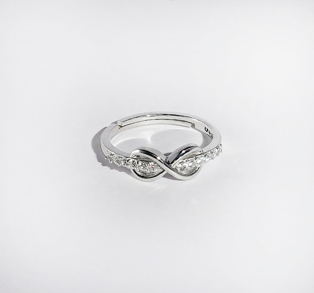 UP-LAYERING INFINITY SILVER RING