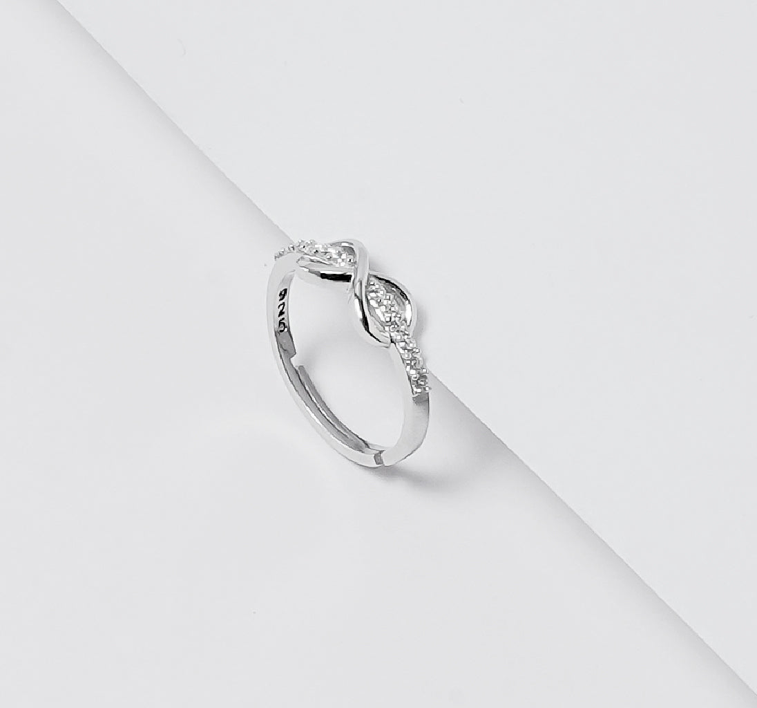 UP-LAYERING INFINITY SILVER RING