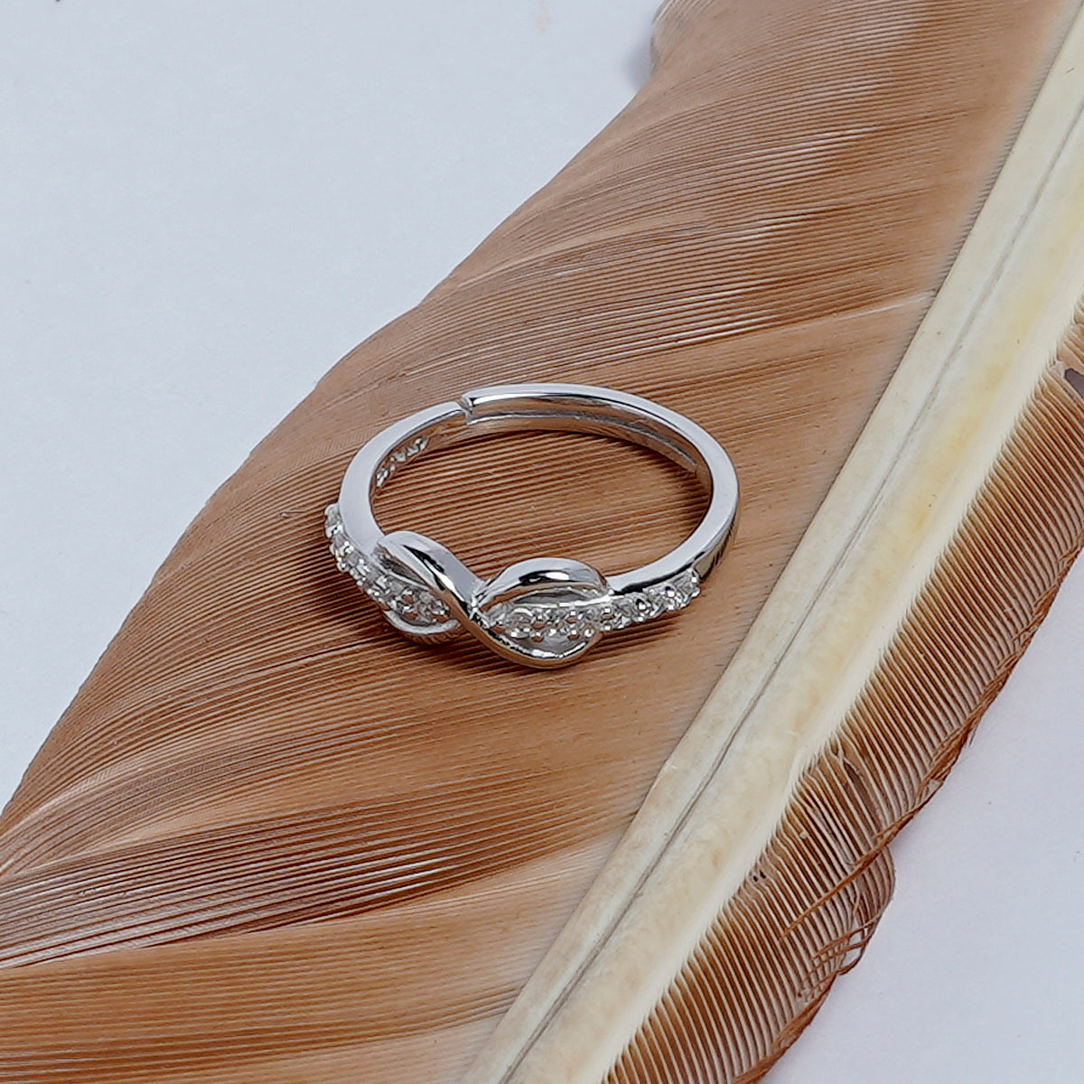 UP-LAYERING INFINITY SILVER RING